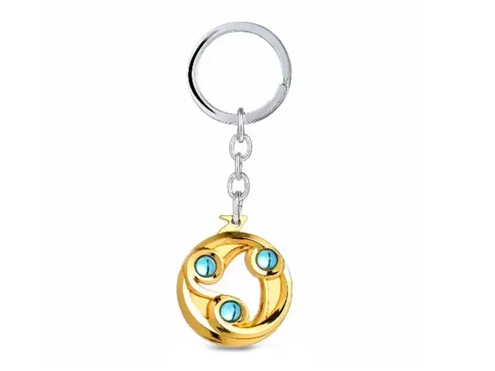LLAVERO DOTA EVASION GOLD, COLOR ORO, 2 ESFERAS CELESTES INCRUSTADA, 2 MOD (EVASION GOLD)